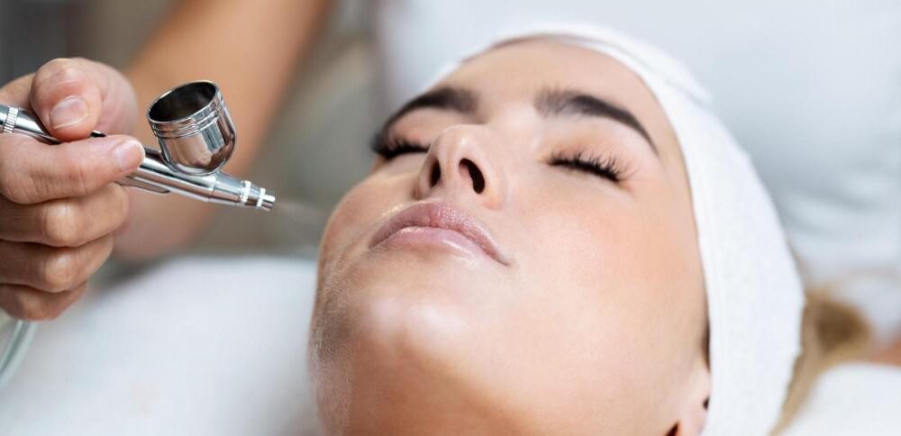 Woman receiving a professional Oxygen Facial Reston VA treatment at a luxury skincare spa